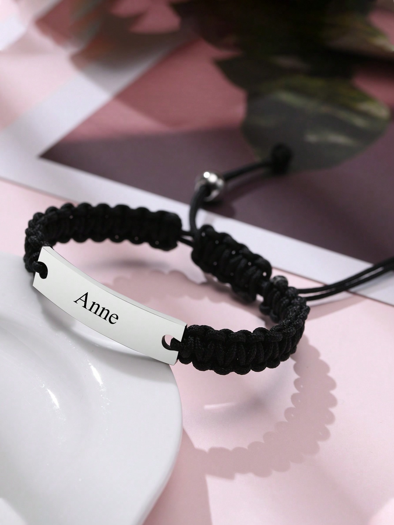 Adjustable stainless steel curved ID bracelet, customizable with name